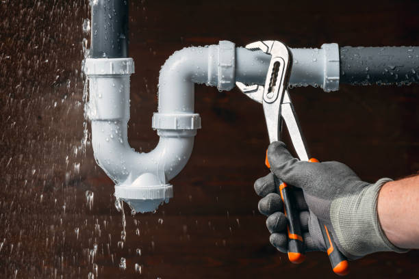 Professional Emergency Plumber technician working in Madison, MD
